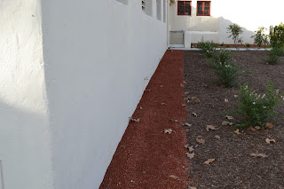 Clean Wall with Red Rock