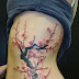 Women Stomach With Stylish Flower Tree Tattoo Leaves