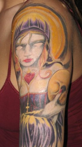 orlando bloom tattoo on arm. jessica szohr tattoo on arm.
