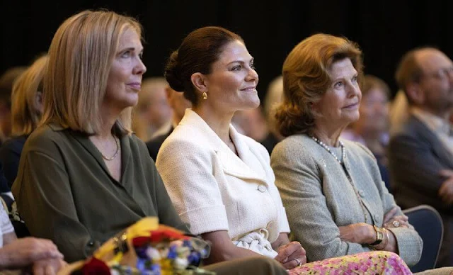 Crown Princess Victoria wore a belted short sleeve blazer by Sandro, and pink plisse pleated midi skirt by & Other Stories