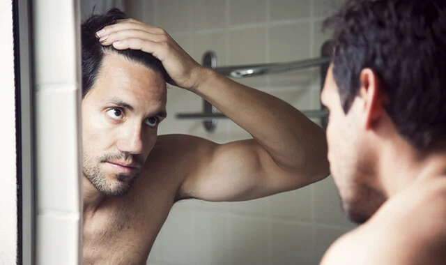 أسباب تساقط الشعر عند الرجال وطريقة علاجه