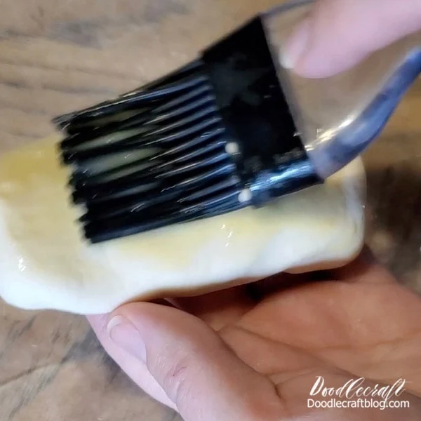 Lightly brush the surface with the beaten egg wash