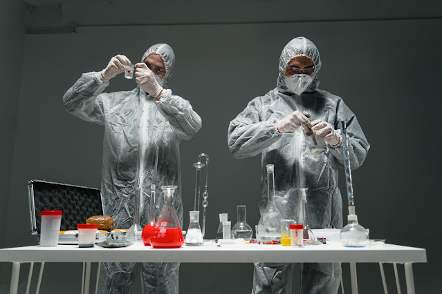 two persons are testing food in laboratory with modern technic