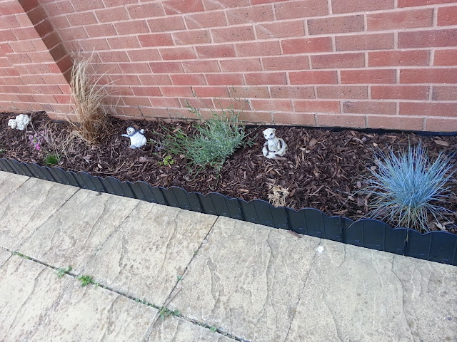 Garden border with ornaments.