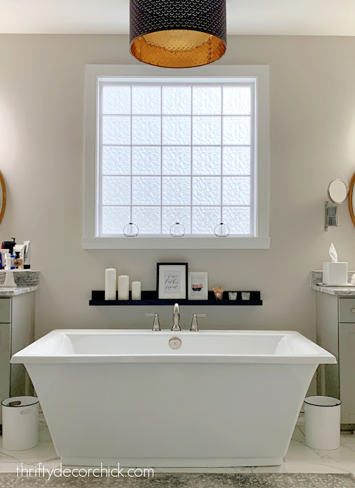 freestanding tub between vanities