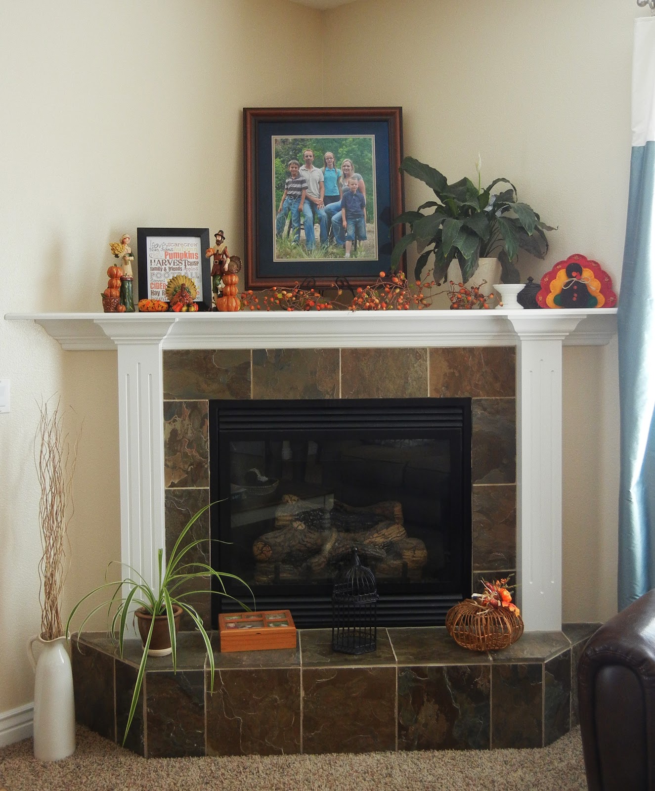 Vanessa's Fireplace, With Its Tile Base And Deep Corner Top Ledge, Is