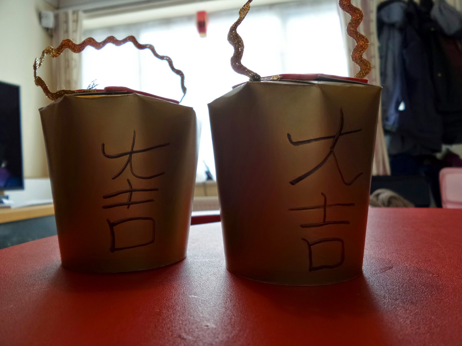 A Chinese Money Cup with Good Fortune written on it