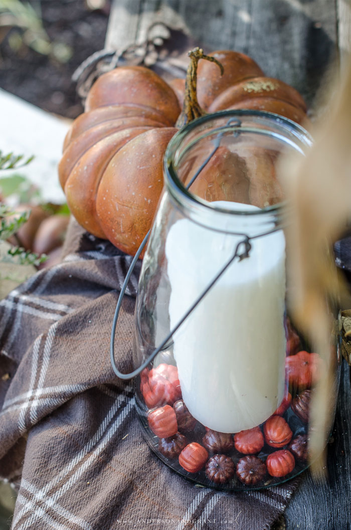 See how to transform your porch for fall using pumpkins, mums, and cornstalks.  |  www.andersonandgrant.com