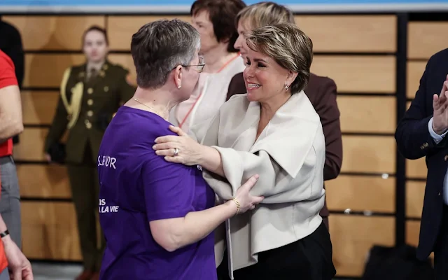 Grand Duchess Maria Teresa wore a light grey coat jacket by Dusan. The Cancer Foundation event at Coque Luxembourg