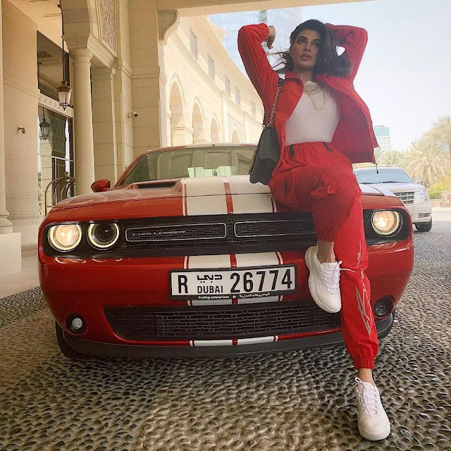 Jacqueline Fernandez red pant