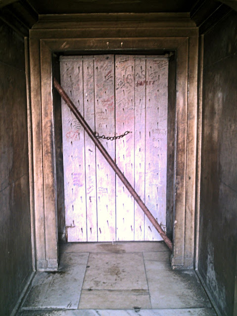 plain locked wooden door at the Agra Fort