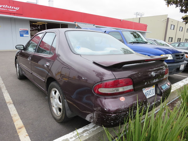 Nissan Altima with oxidized clear coat before complete car paint at Almost Everything Auto Body