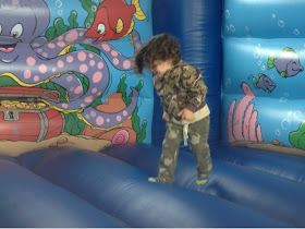 Bouncy castle with my son jumping around on it 