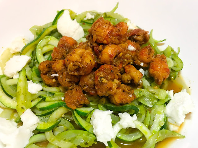 Langoustines cooked with tomatoes on zucchini noodles tossed in salsa verde with goat cheese. Photo by Nicole Ruiz Hudson