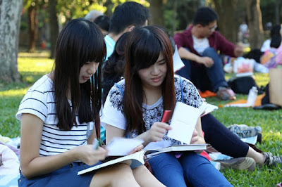 Asian girls reading