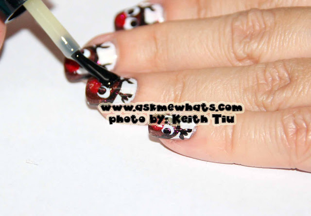 a photo of Rudolf the Red Nose Reindeer Nail Art, Christmas Nail Art Tutorial