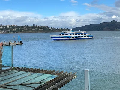 view of ferry and Angel Island from The Inn Above Tide in Sausalito, California