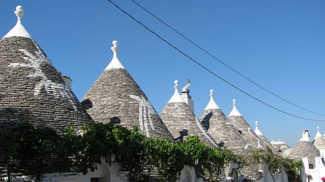 Alberobello, the city of drystone dwellings known as trulli , is an exceptional example of vernacular architecture. It is one of the best preserved and most homogeneous urban areas of this type in Europe. Its special features, and the fact that the buildings are still occupied, make it unique. It also represents a remarkable survival of prehistoric building techniques.