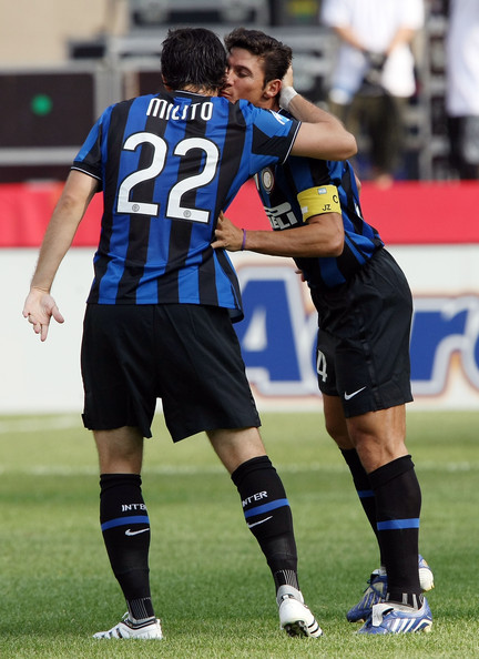 Argentine pair Diego Milito and Javier Zanetti on Monday signed contract