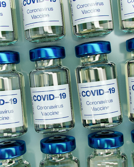 COVID vaccine bottles:Photo by Daniel Schludi on Unsplash