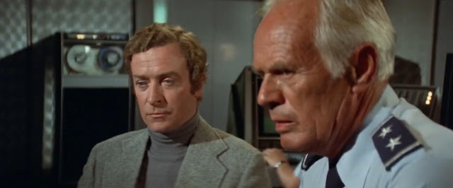 Dr. Crane and Gen. Slater (Richard Widmark) clash
over the best response to the killer bee crisis.