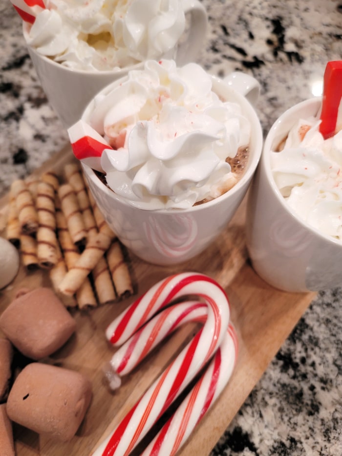 cups of peppermint hot chocolate with whip cream