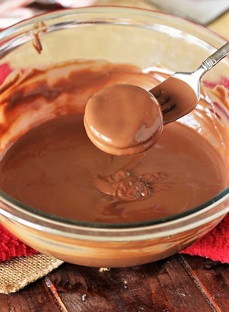 Dipping Peppermint Ritz Cookies in Chocolate Image