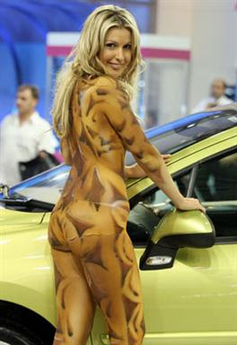 Girl With Sexy Body Painting In Motor Show 