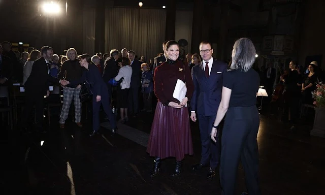 Crown Princess Victoria wore a burgundy pleated faux leather skirt from By Malina, and burgundy wool jacket