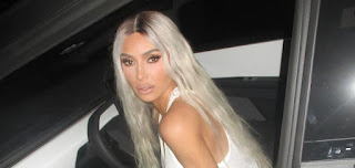 Kim Kardashian Flaunts New Ride: Strikes a Pose in Leather Pants and Crop Top for Sizzling Tesla Cybertruck Photoshoot