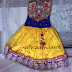 Yellow Lehenga Blue Kundan Blouse