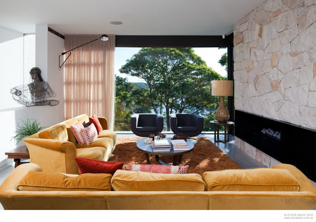 Living room with stone fireplace 