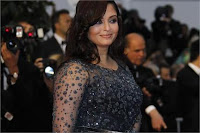 Actress Rai arrives on the red carpet ahead of the screening of the film Cosmopolis in competition at the 65th Cannes Film Festival