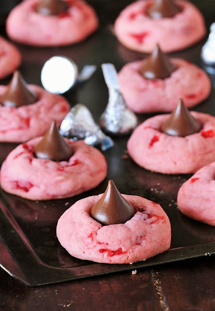 Cherry Kiss Cookies with Hershey's Kisses on Baking Sheet Image