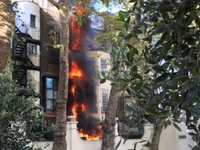 A building that backs onto the Saudi Arabian embassy in London has caught fire