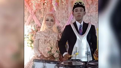 Viral Video Pria Pamer Kepiawaian Main Drumband di Pelaminan, Netizen: Istrinya Senang atau Sedih?