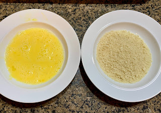 bowl of egg wash and a bowl of breadcrumbs
