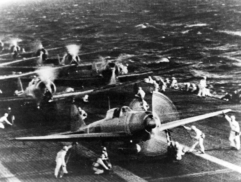 Japanese naval aircraft prepare to take off from an aircraft carrier to attack Pearl Harbor during the morning of 7 December 1941