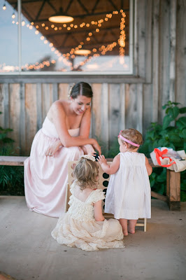 Rustic barn wedding meets vintage fairy tale. Meadow Creek Farm North Alabama Wedding Venue. Vintage Beauty and the Beast inspired wedding reception decoration ideas. Game area, DIY giant connect four