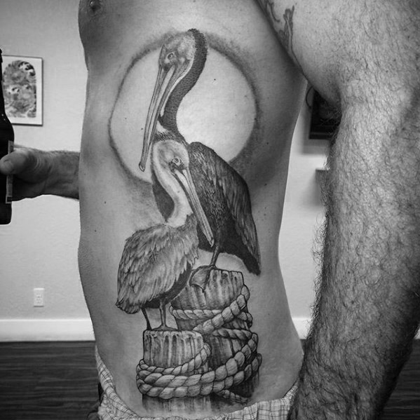 36 tatuagens incríveis de pelicanos para homens!