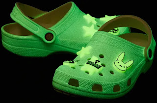 According to several photos supplied by Crocs, the Bad Bunny Crocs are in white and green, and include pins of a rabbit, a flare, stars and Saturn and glows in the dark.