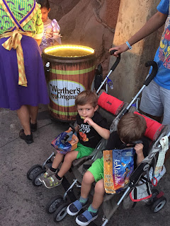 kids and candy at Mickeys Halloween party