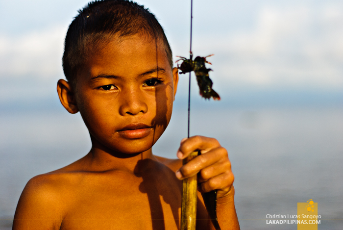 A Kid with a Catch at Tambobong Beach in Dasol, Pangasinan