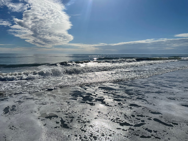 The 3rd of three pictures showing the wave as it ambles along to the shore.