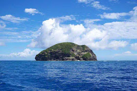 small, uninhabited island, in ocean