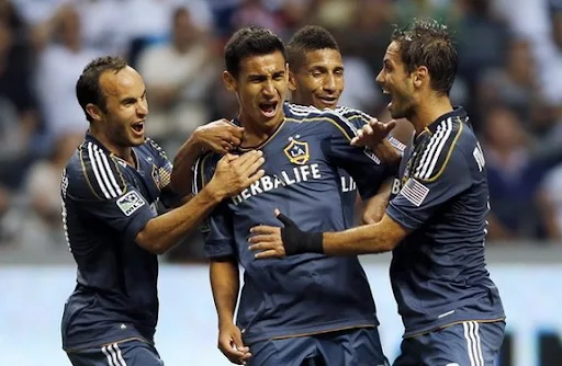 Jose Villarreal celebrates his goal against the Vancouver Whitecaps with LA Galaxy teammates