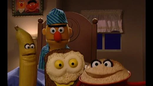 Sesame Street Episode 4279. We see Ernie and Bert. Ernie sings a song, it is Breakfast is the Best Meal of the Day with a singing banana, toast with eggs and a bowl of oatmeal.