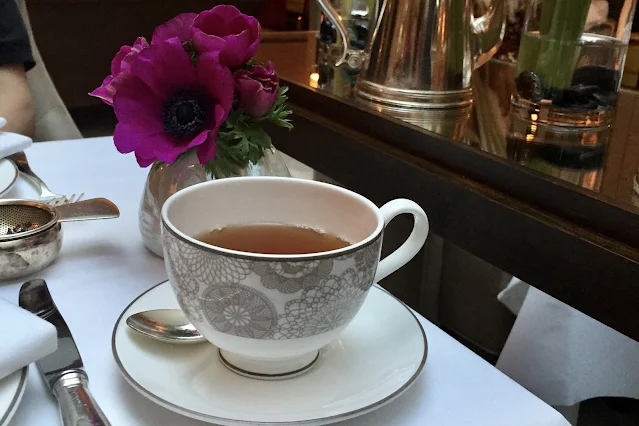 A properly poured cup of tea in china as part of an afternoon tea in Essex