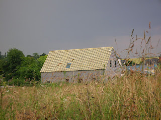 construction maison bois, pare-pluie, toiture protégée