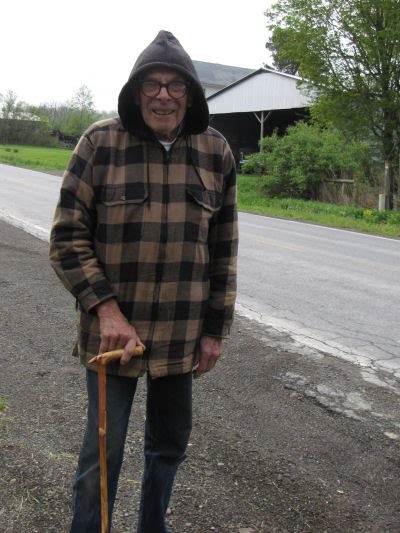 old man with hiking stick